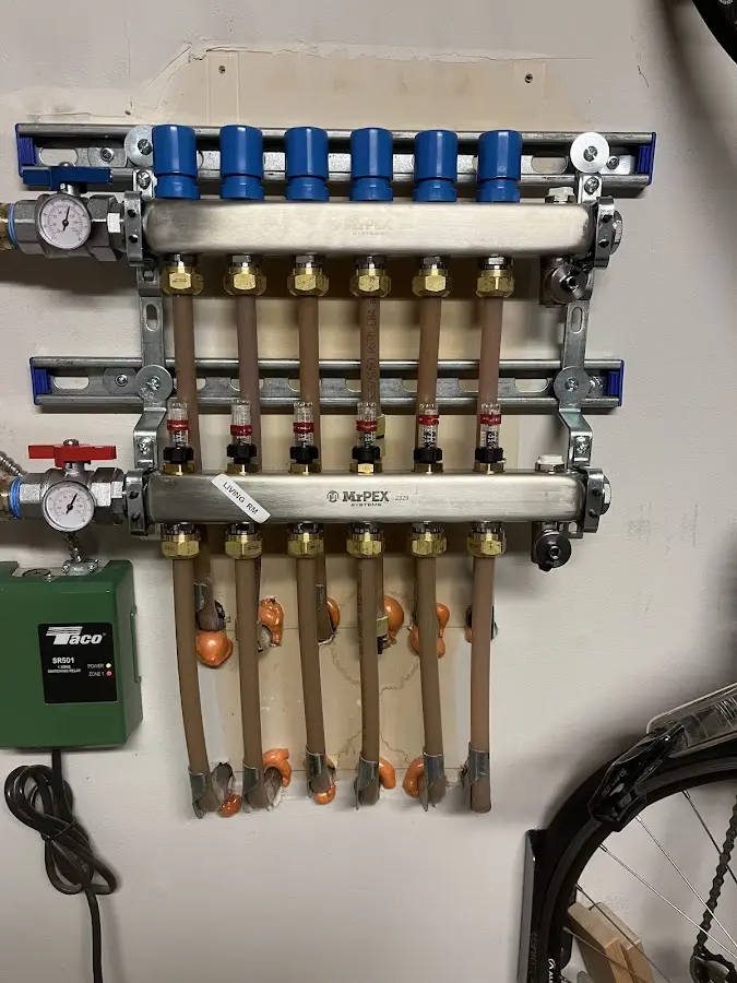 Plumber performing Gas Line Installation at a residential property in Springdale